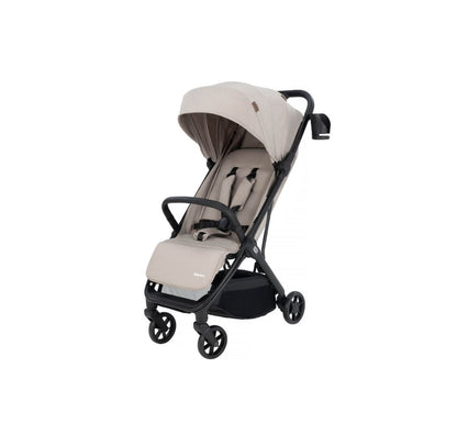 A compact stroller with a light beige (latte) canopy and seat liner, a black frame, and black wheels, shown from a three-quarters angle on a solid white background.
