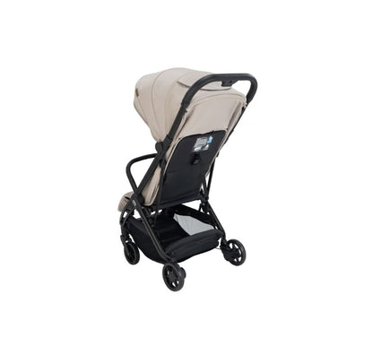 A compact stroller with a light beige (latte) canopy and seat liner, a black frame, and black wheels, shown from a three-quarters angle on a solid white background.