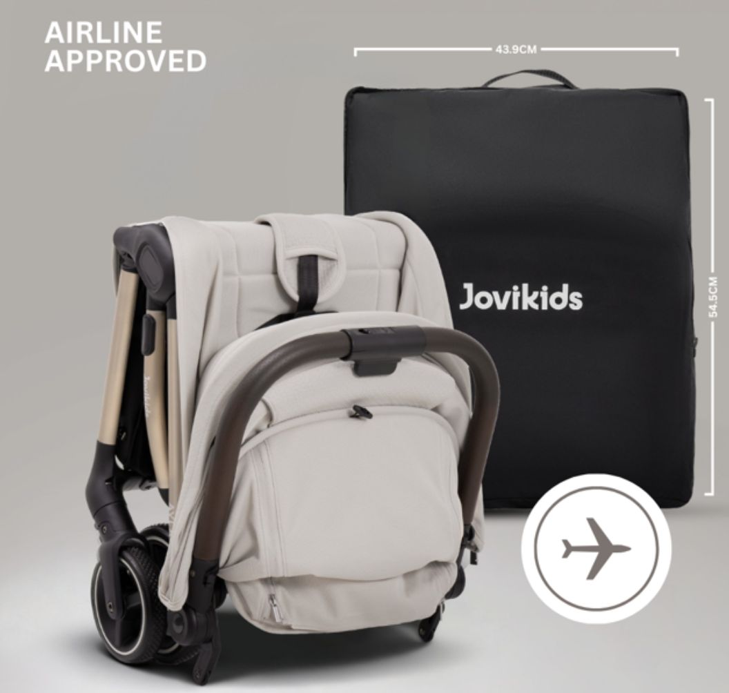 A compact stroller with a light beige canopy and seat, handlebars, and a black frame, shown on a neutral gray background with text at the top reading 'SUITABLE FROM BIRTH TO APPROX. 22KG'.