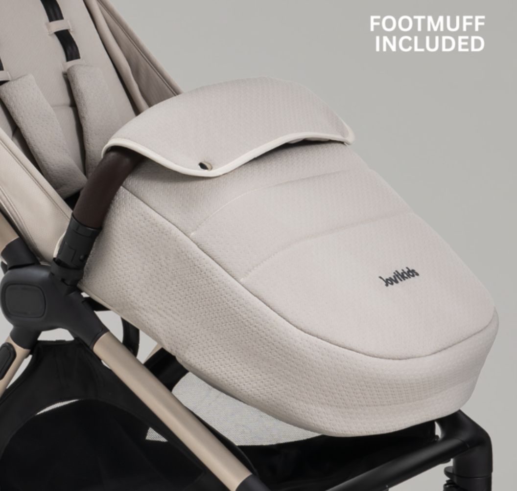 A compact stroller with a light beige canopy and seat, handlebars, and a black frame, shown on a neutral gray background with text at the top reading 'SUITABLE FROM BIRTH TO APPROX. 22KG'.