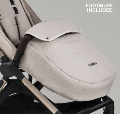 A compact stroller with a light beige canopy and seat, handlebars, and a black frame, shown on a neutral gray background with text at the top reading 'SUITABLE FROM BIRTH TO APPROX. 22KG'.